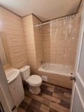 Baño terminado con cerámica